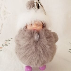 Baby Face Gray Pom Pom Keychain. New